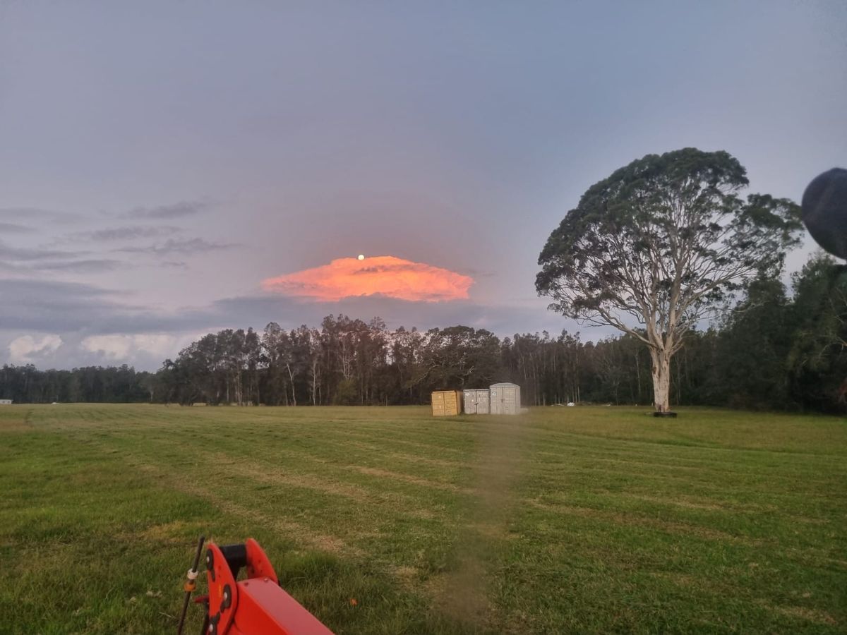Sunset clouds over the farm
